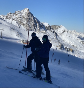 Two people skiing