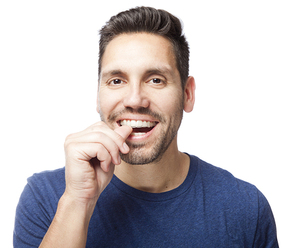 Man placing Clear Aligners tray