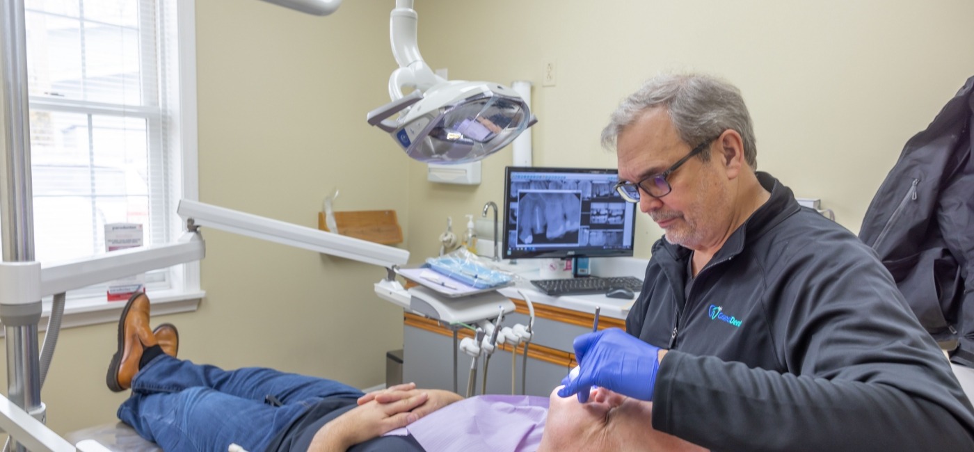 South Elgin Illinois dentist Doctor Tom Siewert treating a dental patient