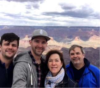 Doctor Siewert with his wife and two grown sons at the Grand Canyon