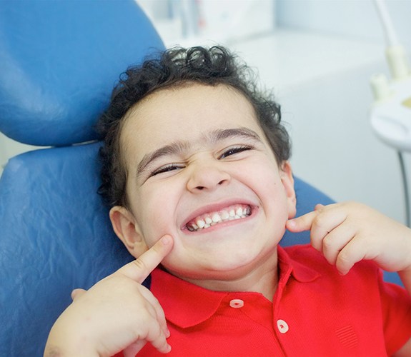 Child smiles after Phase 1 orthodontics in South Elgin, IL